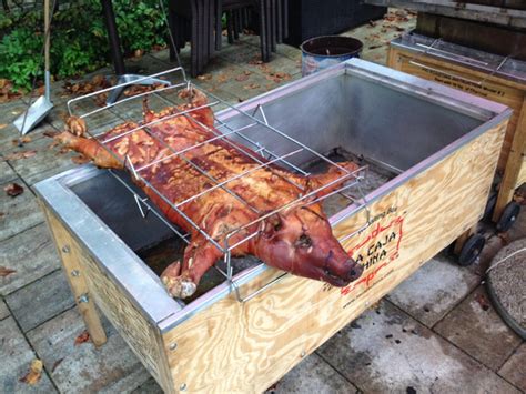 roasting a pig in a box